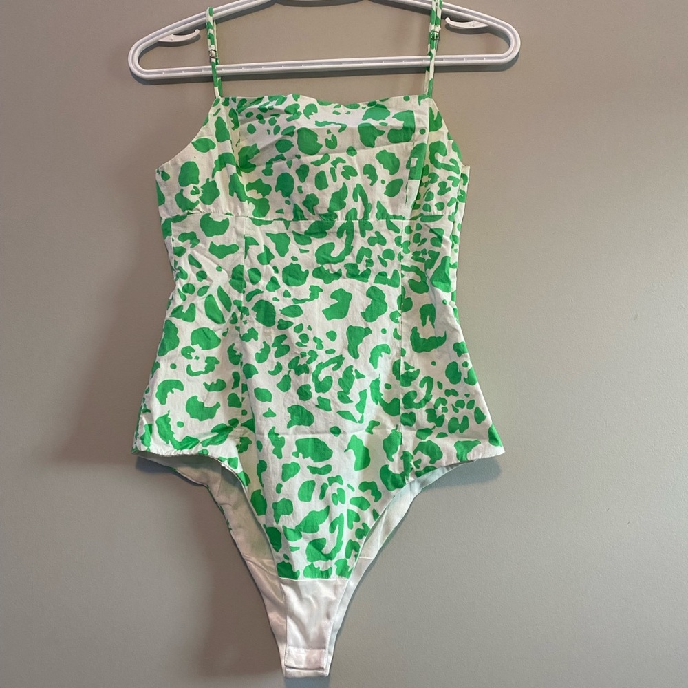 Neon cow print bodysuit